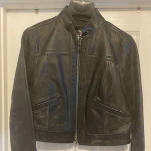 Black distressed leather jacket.